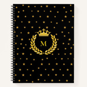 Monogramm, Krone, Lorbeer und goldene Sterne auf S Notizblock