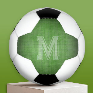 Monogramm mit grungy Chalkboard Grünem Hintergrund Fußball