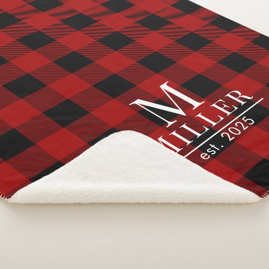 Monogramm-Name des rustikalen Rot- und Schwarz-Buf Sherpadecke (3/4)