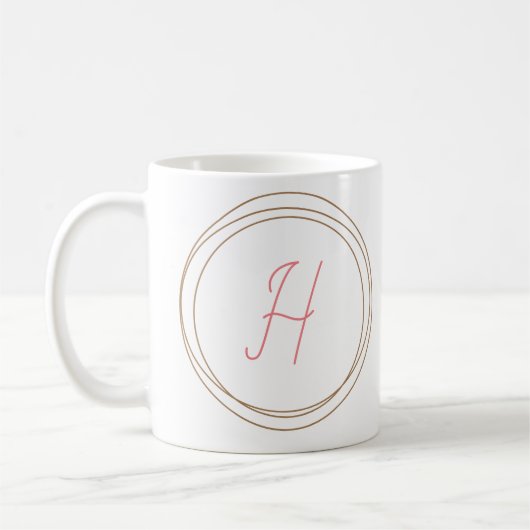 Monogramm-Tasse "H" Kaffeetasse (Links)