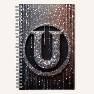 Monogramm U mit glitzernden Tropfen Notizblock