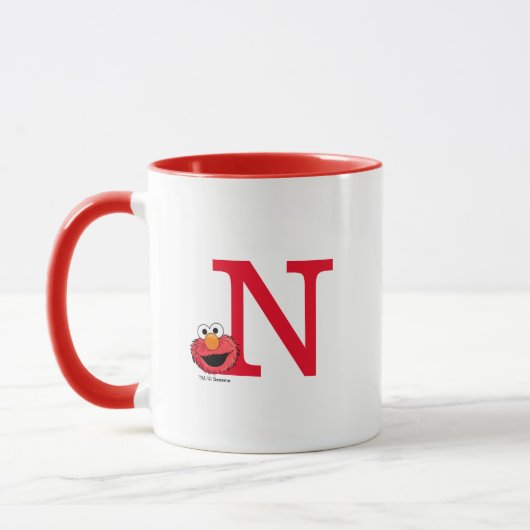 Monster am Ende dieser Geschichte | Elmo Monogram Tasse (Links)