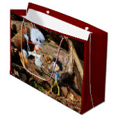 Monster Fubby op schommel. Große Geschenktüte (Vorderseite Schrägansicht)