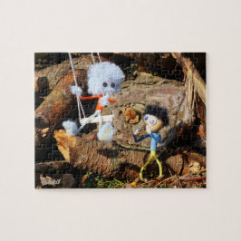Monster Fubby op schommel. Puzzle