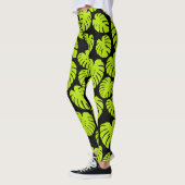 Monstera-Blätter in Lime Green und Schwarz Leggings (Links)