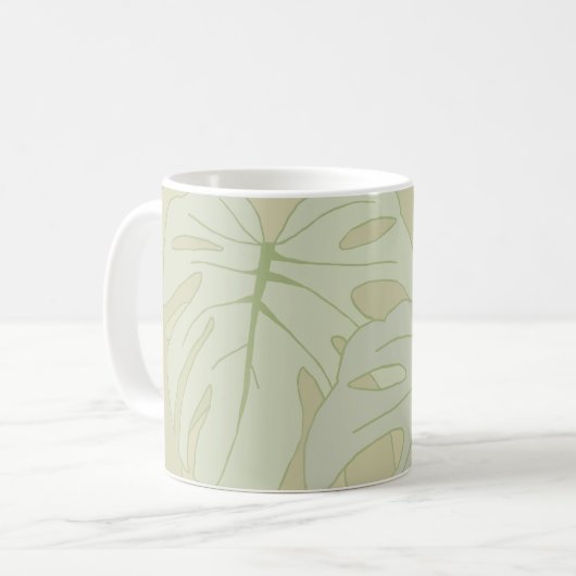 Monstera foliage in weichem Grün Kaffeetasse (Vorderseite Links)