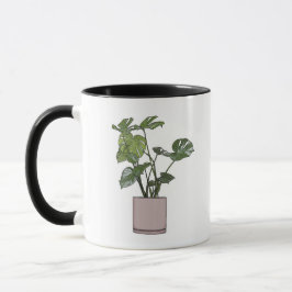 Monstera in einer rosa Pot-Tasse Tasse