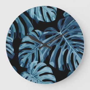 Monstera Pflanze: blaues Blätter Muster. Große Wanduhr