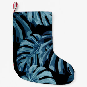 Monstera Pflanze: blaues Blätter Muster. Kleiner Weihnachtsstrumpf
