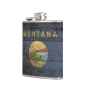 Montana-Staats-Flagge auf altem hölzernem Korn Flachmann (Links)