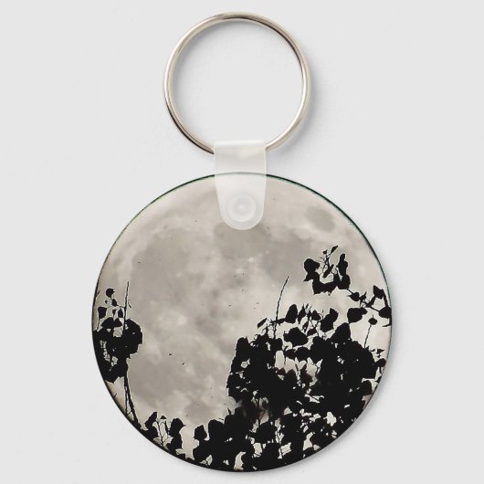Moon hinter dunklen Blätter Schlüsselanhänger (Vorderseite)