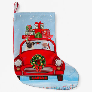 Mops-Hund im Auto mit dem Weihnachtsmann Kleiner Weihnachtsstrumpf