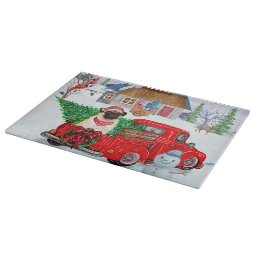 Mops Hund in der Weihnachtslieferung LKW Schnee Schneidebrett (Ecke)