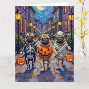 Mops-Hunde beim Trick-or-Treat in Halloween-Kostüm Karte