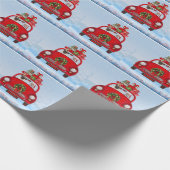 Mops mit dem Weihnachtsmann im Auto Geschenkpapier (Ecke)