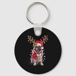 Mops mit Rentierfäusten im Weihnachtslieg Schlüsselanhänger