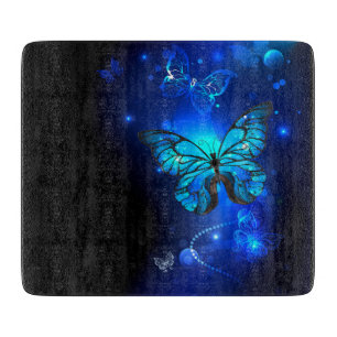 Morpho-Schmetterling im dunklen Hintergrund Schneidebrett