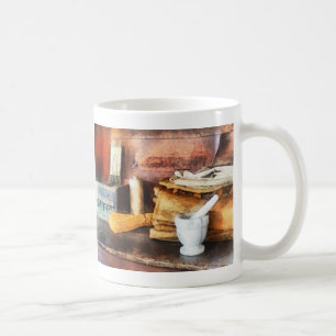 Mörser mit Stößel und Kakaobox Kaffeetasse