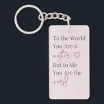 Mother’s Day Keychain Schlüsselanhänger<br><div class="desc">Celebrate the love of motherhood with this elegant Mother’s Day keychain featuring the heartfelt quote: “To the world you are a mother, but to me you are the world.” This minimalist typography design combines classic serif lettering with a graceful script font, creating a timeless and meaningful gift for mom. The...</div>