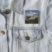 Mountainsee in einem Tal mit blauem Himmel Button (Beispiel)