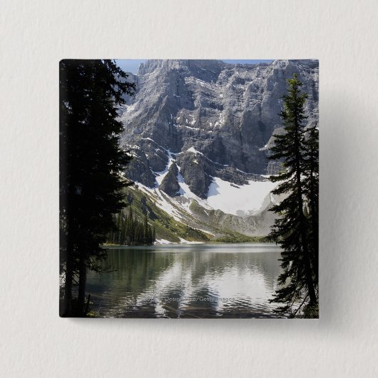Mountainsee-reflektierender Berg gerahmt durch Button (Vorderseite)