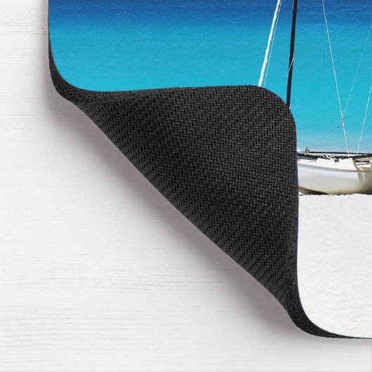 Mousepads mit einem Bild der Boote auf einem (Ecke)