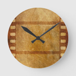 MOVIE REEL ALT-FASHIONIERTER GRUNDGOLDHINTERGRUND RUNDE WANDUHR