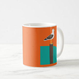 Möwe nahe einem Sandstrand Kaffeetasse