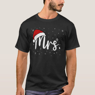 Mr. und Mrs. Claus Weihnachtspaare, die ihm einen T-Shirt