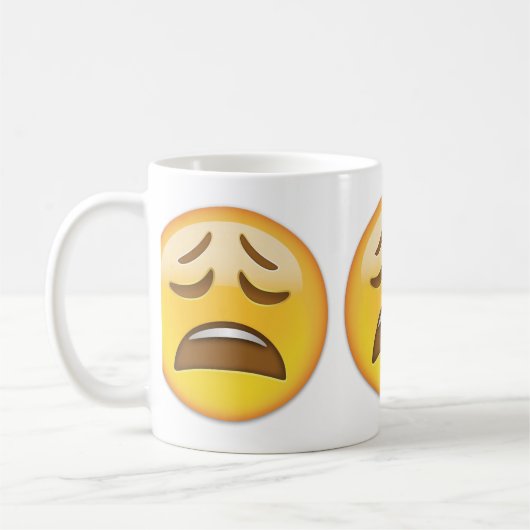 Müdes Gesicht Emoji Kaffeetasse (Links)