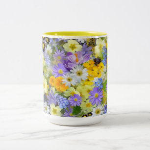 MULITCOLORED FLORAL HINTERGRUNDPATTER ZWEIFARBIGE TASSE