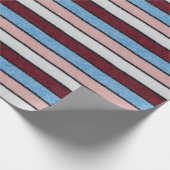 Multicfarbene Stripwolle: Stoffgewebe. Geschenkpapier (Ecke)