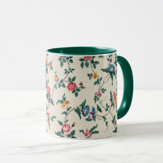 Multicolored flower pattern green trim, tasse