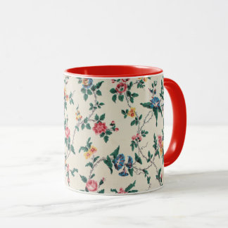 Multicolored flower pattern, red trim, tasse