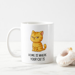 Mürrische orange getigerte Katze Kaffeetasse