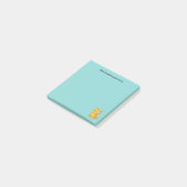 Mürrische orange getigerte Katze mit individuellem Post-it Klebezettel (angewinkelt)