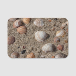 Muscheln am Strand Namensschild