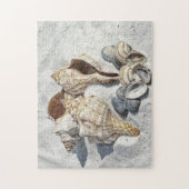 Muscheln am weißen Sandstrand Puzzle (Vertikal)
