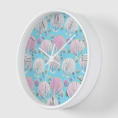 Muscheln auf türkisblauem Hintergrund Wanduhr (Winkel)