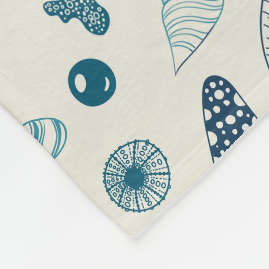 Muscheln auf weißlich fleecedecke (Ecke)