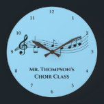 Musical Notes Band Teacher Custom Music Class Große Wanduhr<br><div class="desc">A cool custom music class wall clock featuring a musical staff with notes on a blue background. Order for a musician,  composer,  band or orchestra conductor,  or choir director and personalize with a music department name or other text.</div>