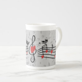 Musik liebt Vögel auf grauen musikalischen Notizen Porzellantasse