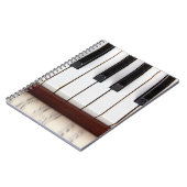 musikalische Noten auf dem Hintergrund eines piano Notizblock (Linke Seite)