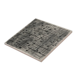 Musikalische Noten zur dunklen Holzkohlestruktur Fliese