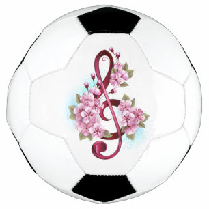 Musikalische Tischtennisnotizen mit Sakura-Blume Fußball