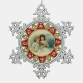 MUSIKANGELSTAR SCHNEEFLOCKEN Zinn-Ornament (Vorderseite)