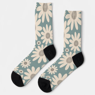 Muster aus Kamillenblüten auf einem weichen Grün Socken