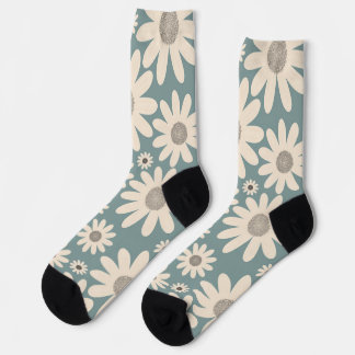 Muster aus Kamillenblüten auf einem weichen Grün Socken