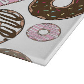 Muster der Donuts, rosa Donuts, braune Donuts Schneidebrett (Ecke)