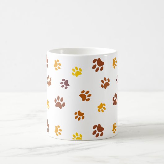 Muster der gelben orangefarbenen, braunen Paw-Prin Verwandlungstasse (Mittel)